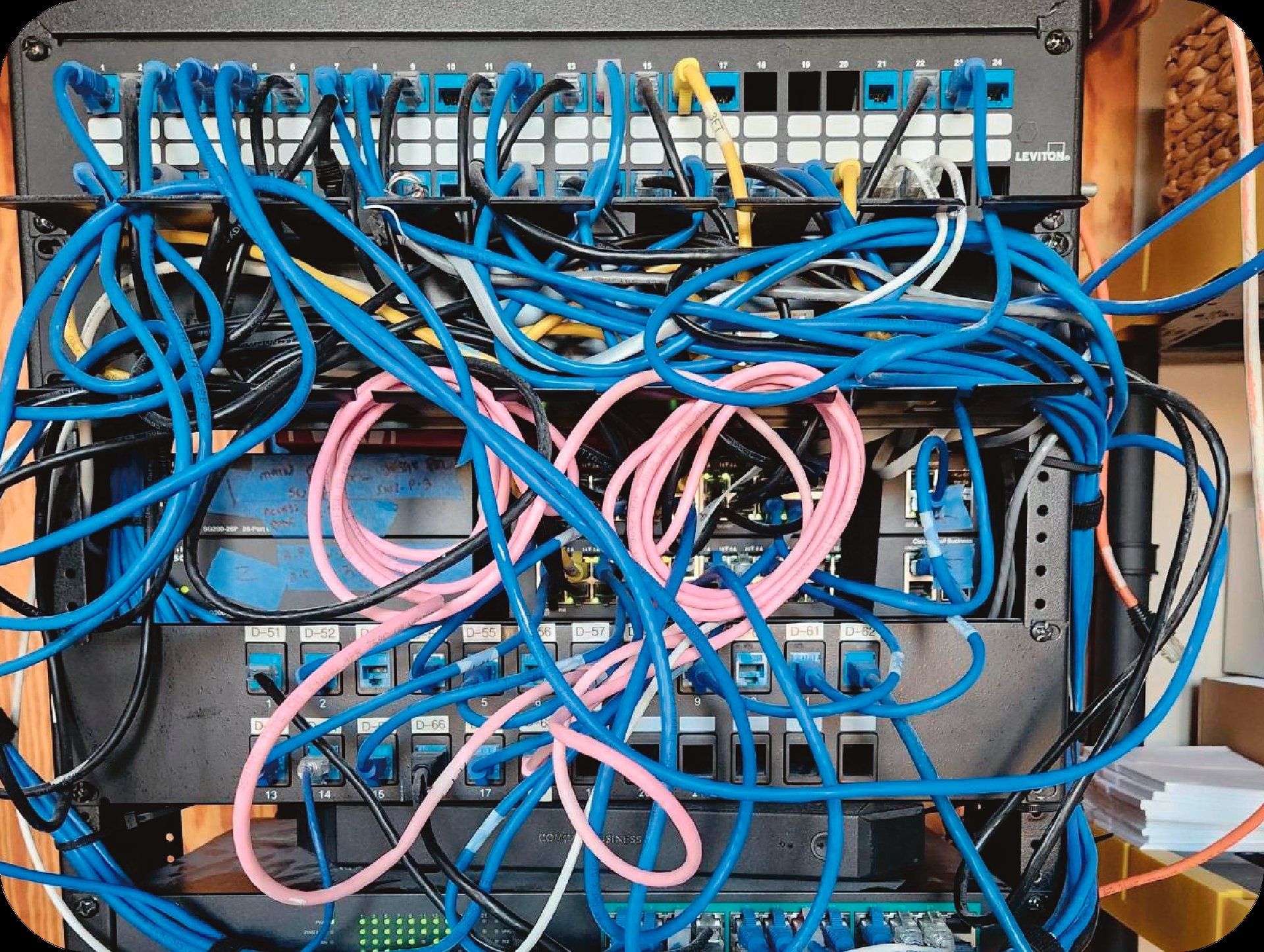 Unreliable school network cabling in a Pittsburgh server room before Spera Partners' infrastructure optimization.